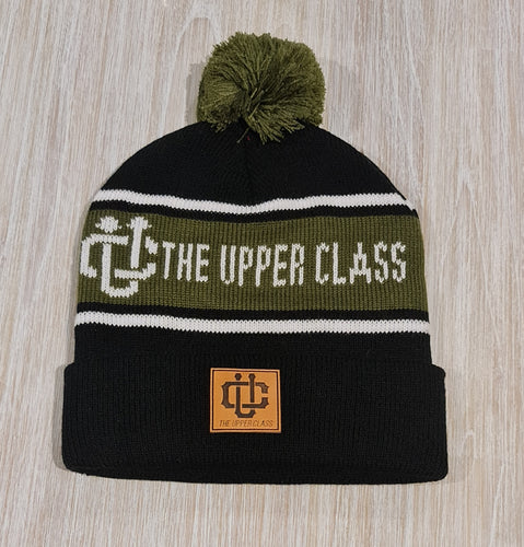 olive green, white and black beanie