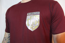 Load image into Gallery viewer, Maroon tall tee with gold and silver shield print
